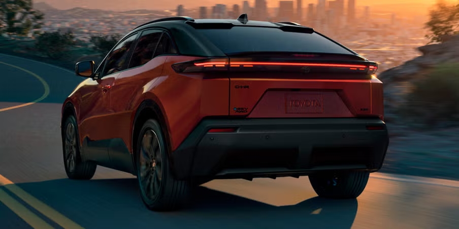 2026 Toyota C-HR BEV electric SUV, Toyota C-HR battery electric vehicle, 2026 C-HR BEV range, Toyota Safety Sense 3.0, regenerative braking, fast charging, dual wireless chargers, all-electric compact crossover, Toyota EV lineup, zero emissions SUV, 300-mile range EV, futuristic design, LED headlights, aerodynamic styling, sustainable interior materials, Apple CarPlay Android Auto, advanced driver assistance, urban electric SUV, Toyota of Cool Springs