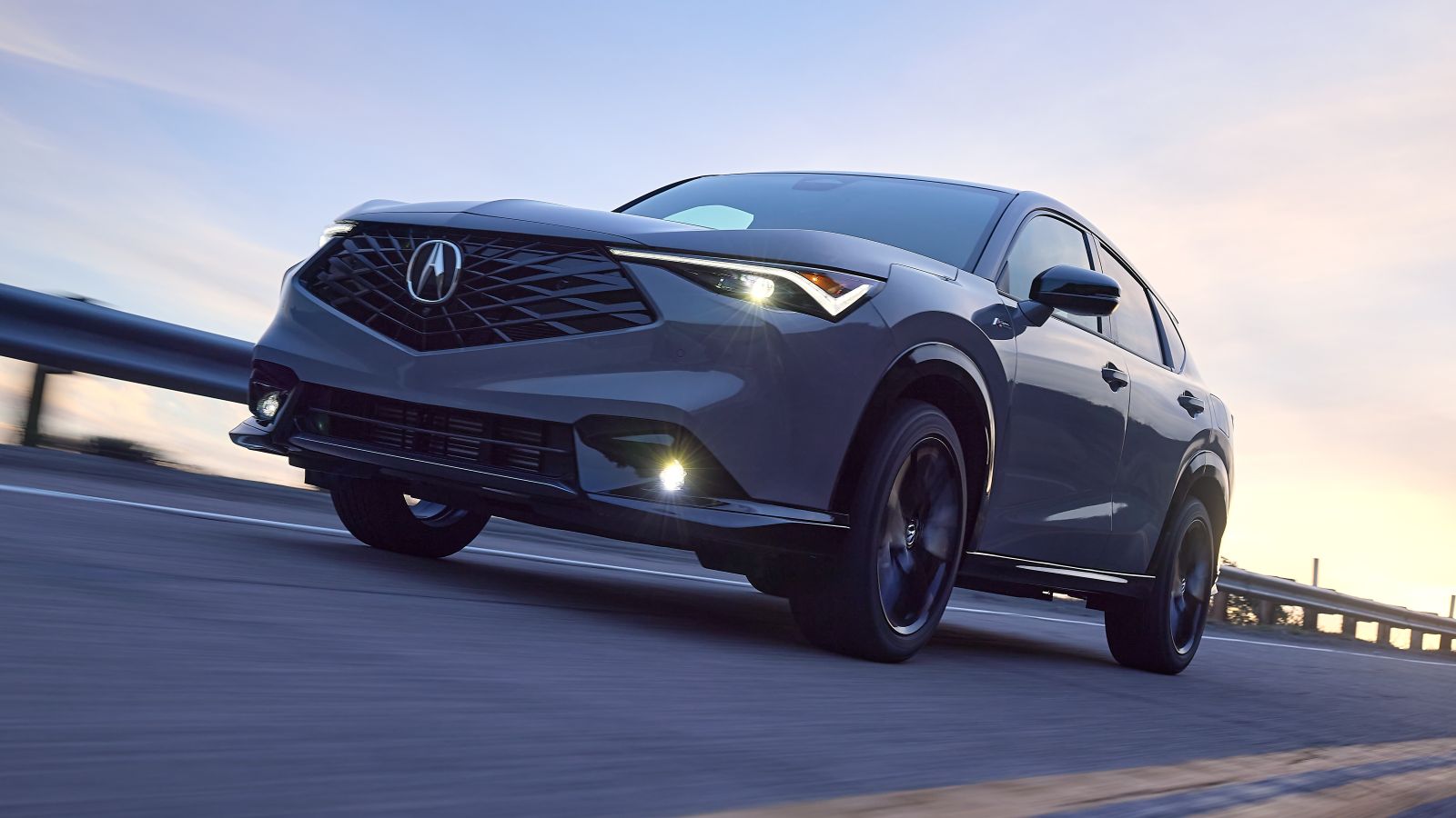 Naples Acura service technician reviewing vehicle maintenance information