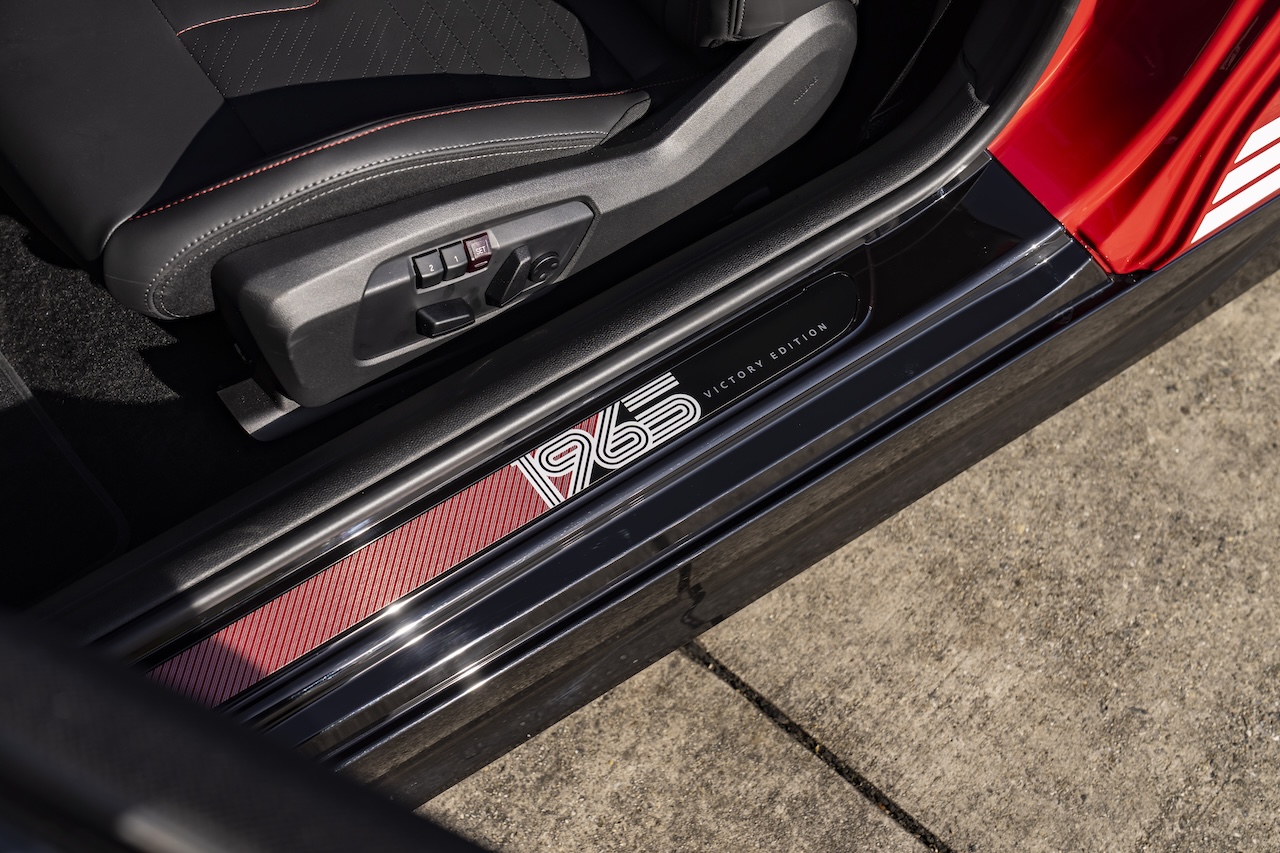 Rally-inspired embroidered door sill detail inside the MINI 1965 Victory Edition cabin