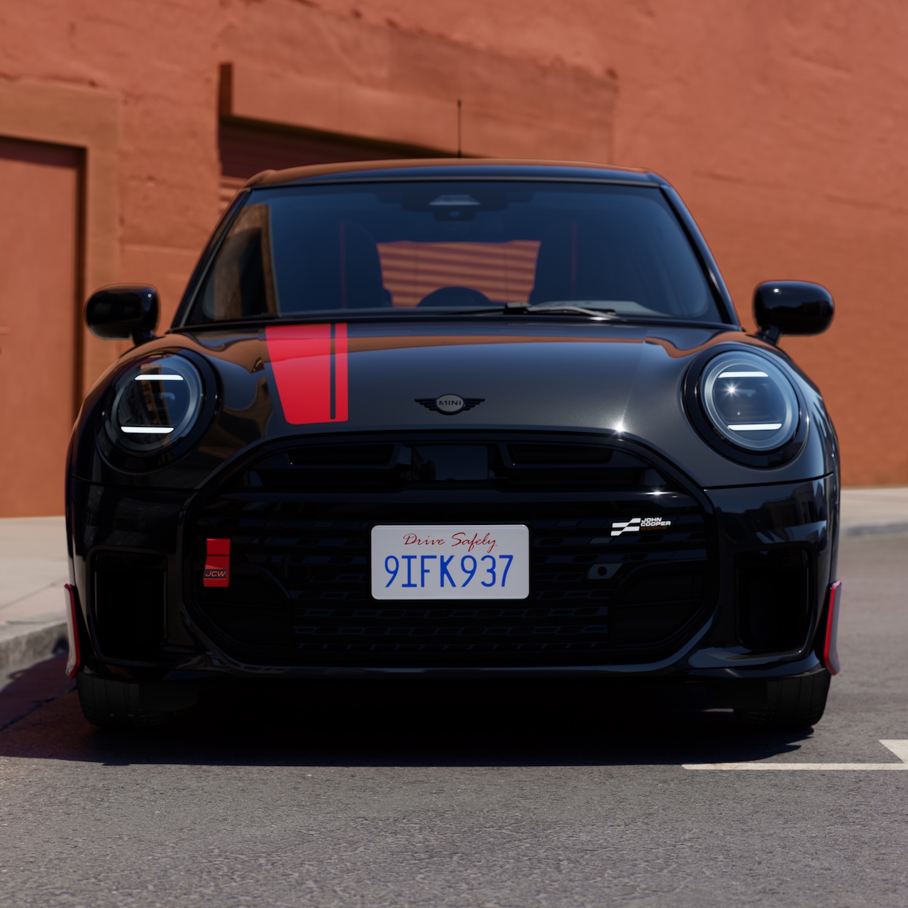 2026 MINI Red Line Edition front-facing view with exclusive Legend Grey Metallic paint and Chili Red accent stripe