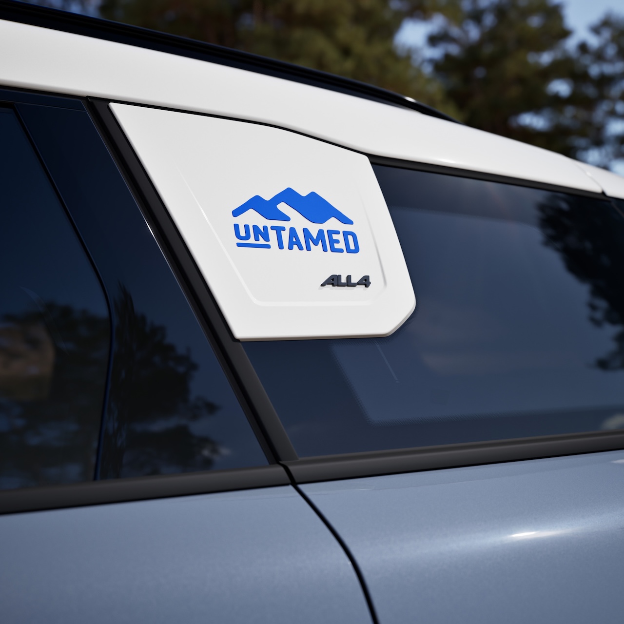 Close-up of the 2026 MINI Countryman Untamed Edition C-pillar showing exclusive Untamed badging Dark Steel accents and matte black exterior decals